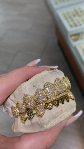 Custom Straight Setting with Diamond Bar and Blue Diamond Fangs Grillz